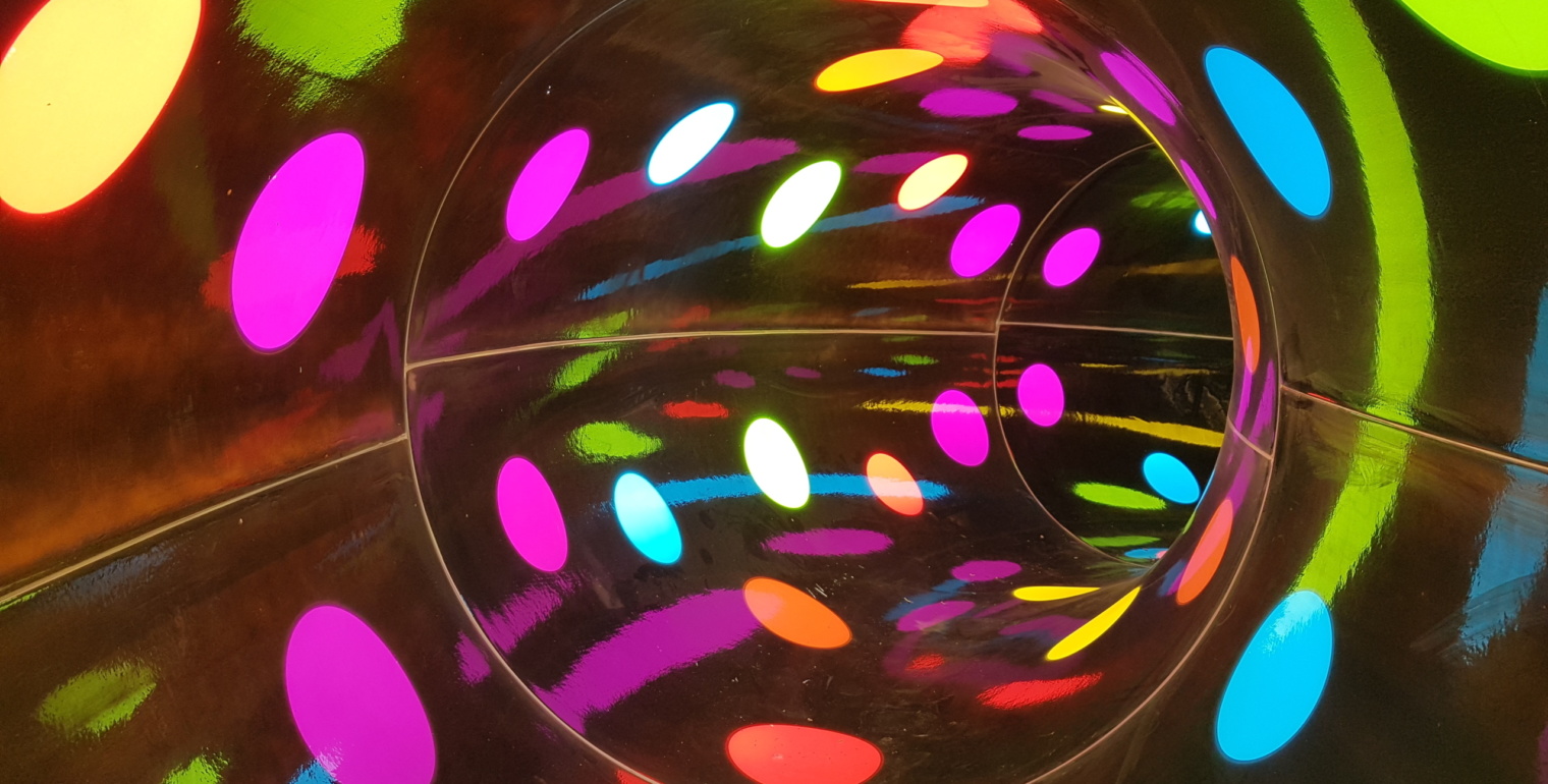 A picture of a closed slide with different colored lights inside