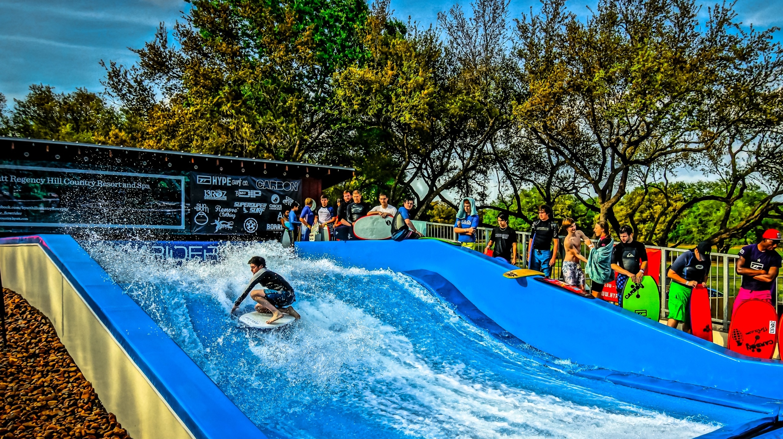 Teenagers waiting in line to play FlowRider