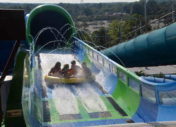 People on a water slide raft