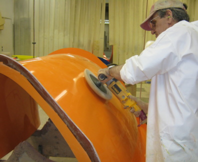 Workers are grinding pipes