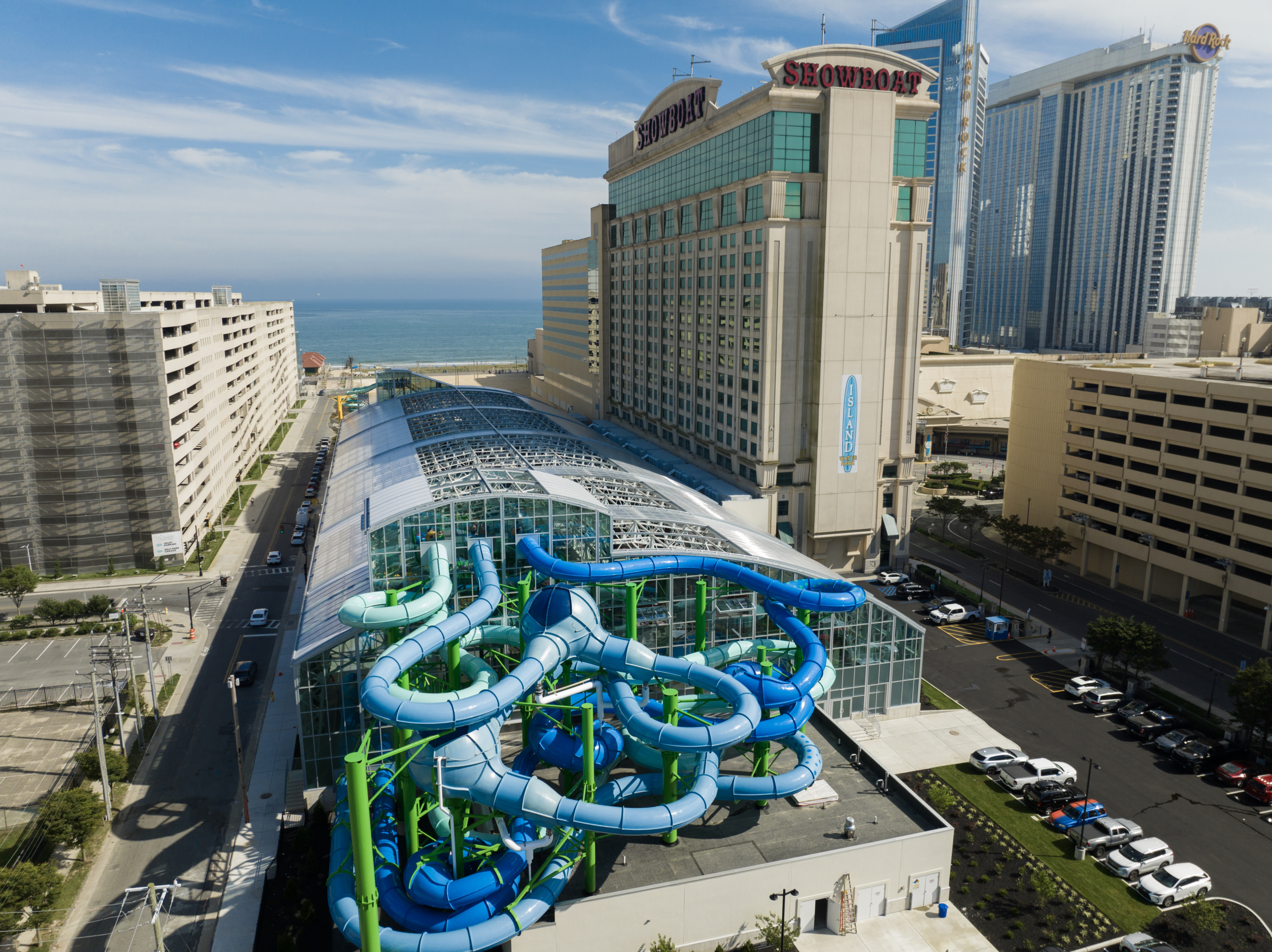 Outside view of an indoor water park with protruding water slides