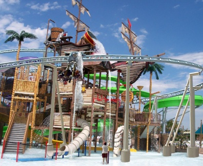 A little boy is holding a water pipe