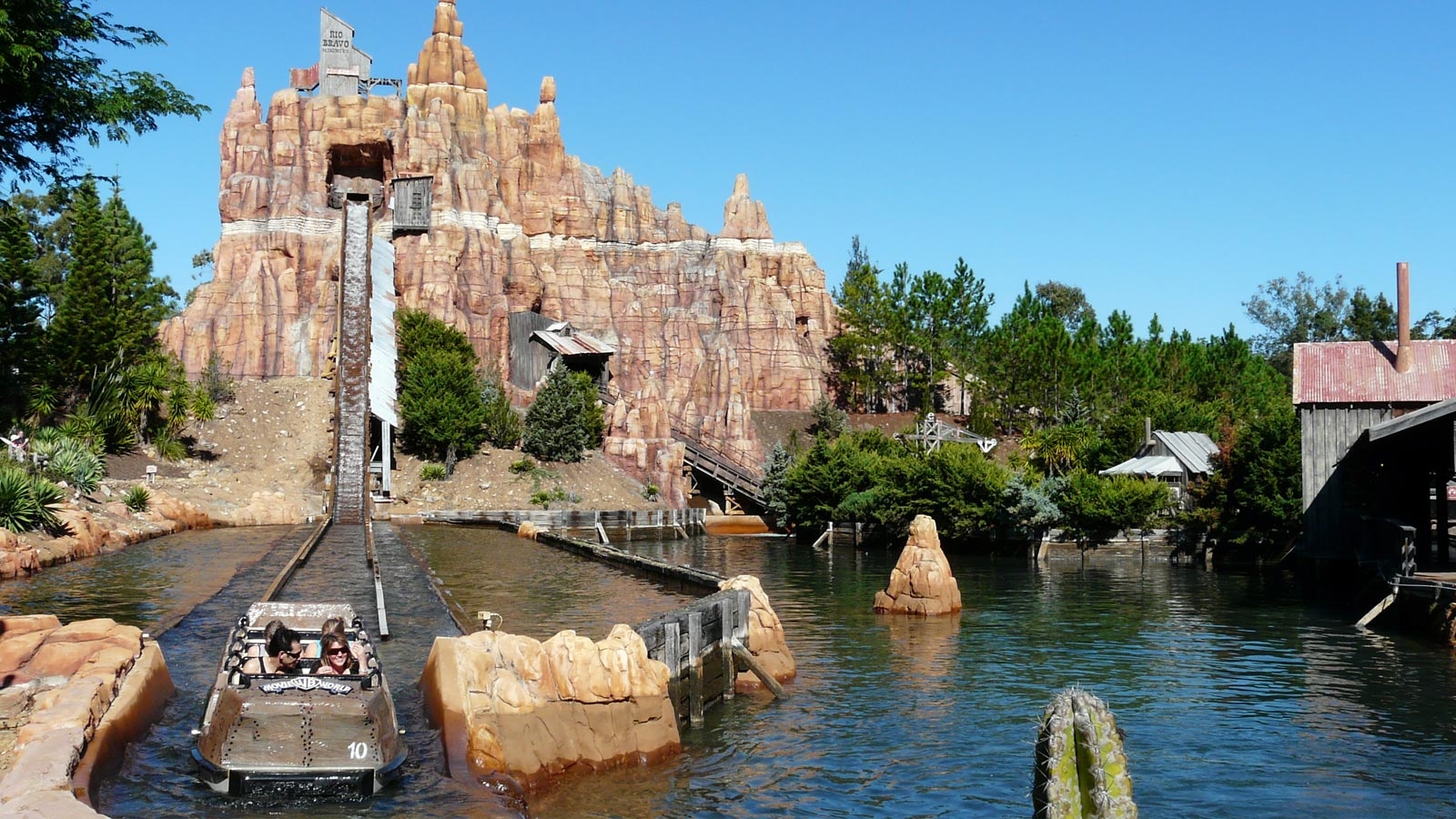 Four people just finished their water slides